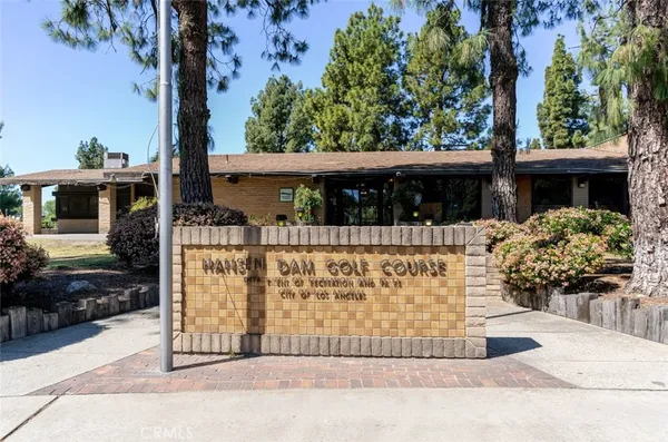 a view of a house with large windows