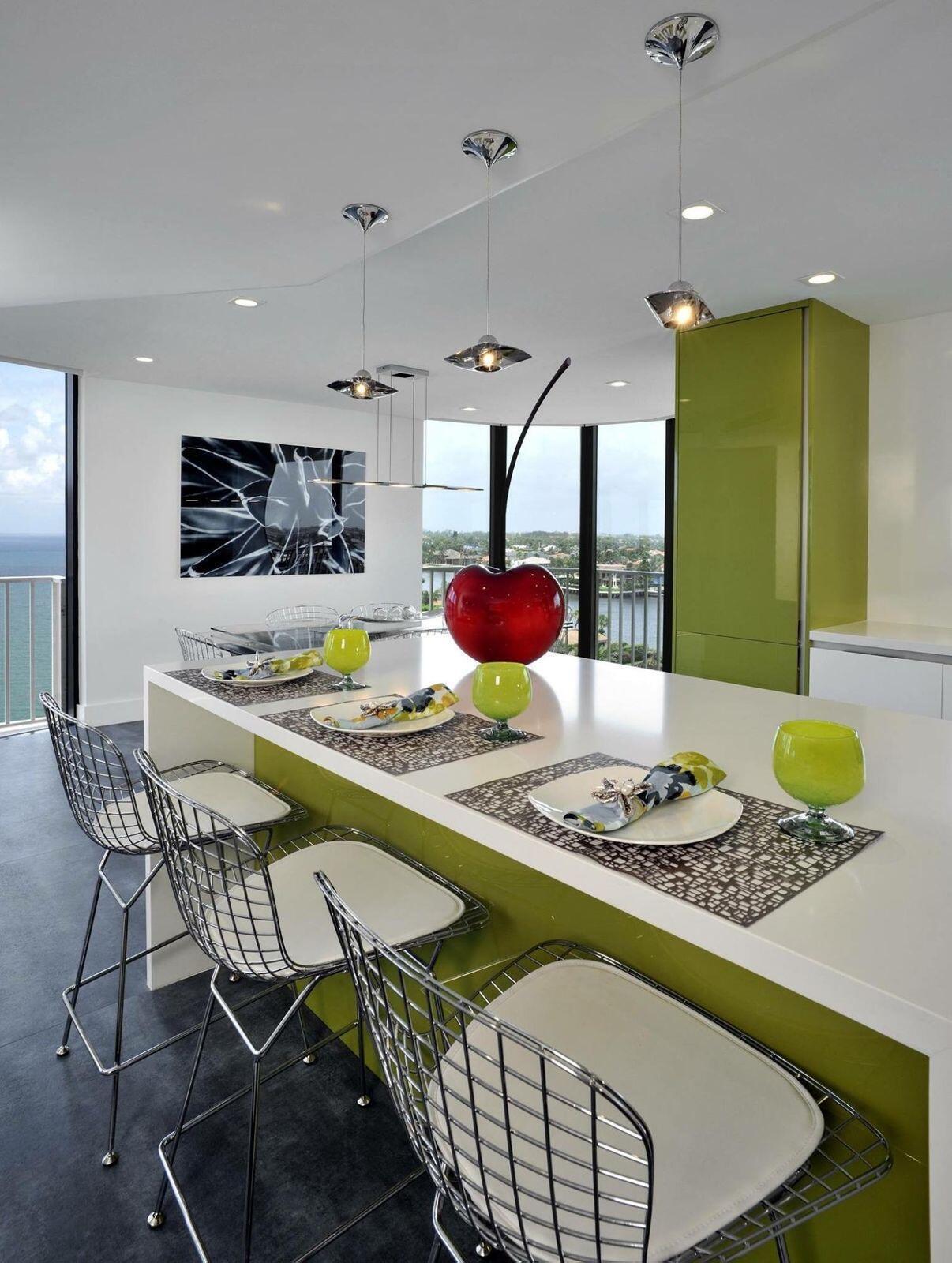 2917 South Ocean Boulevard, Unit 705 Highland Beach, FL 33487 - Photo 3 of 4 a table that has some flowers on it