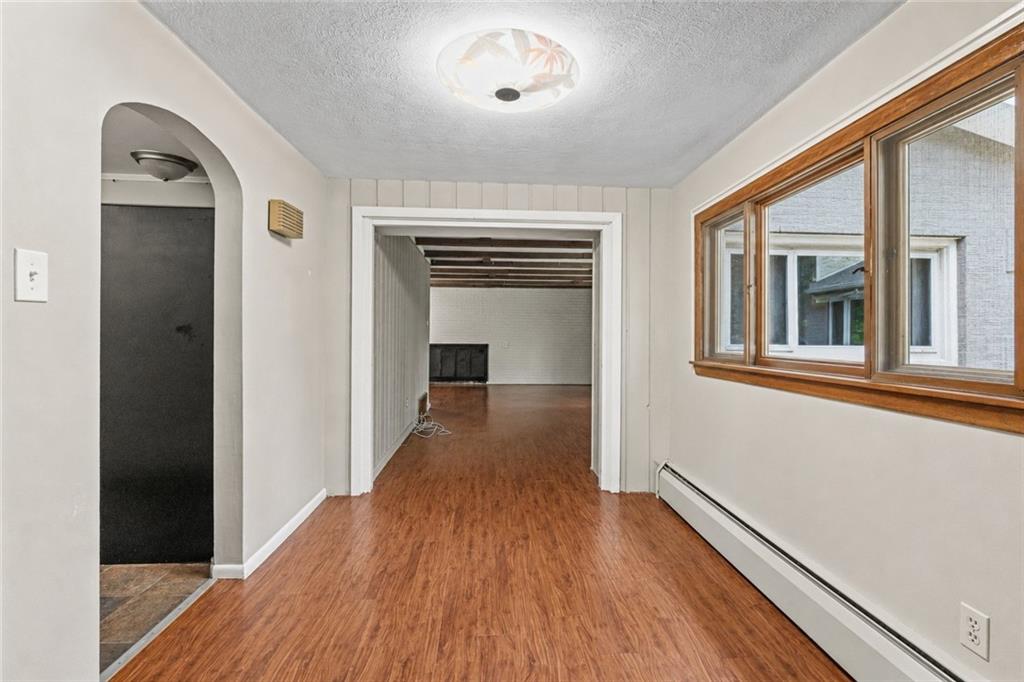 311 Redgate Road Sewickley, PA 15143 - Photo 4 of 22 HALLWAY TO LIVING ROOM AND KITCHEN
