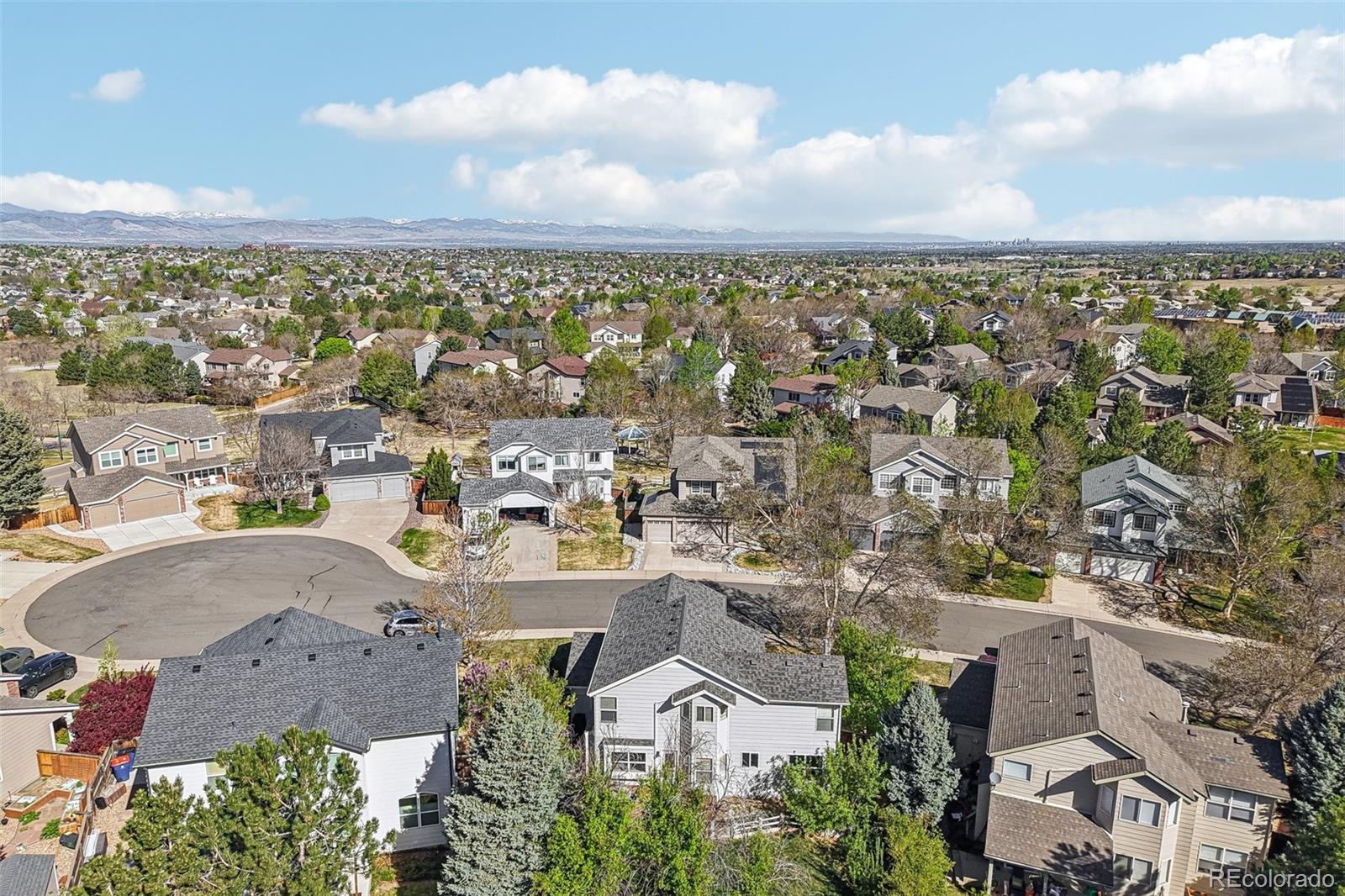 6642 Tiger Tooth Lone Tree, CO 80124 - Photo 43 of 44 an aerial view of residential houses with outdoor space