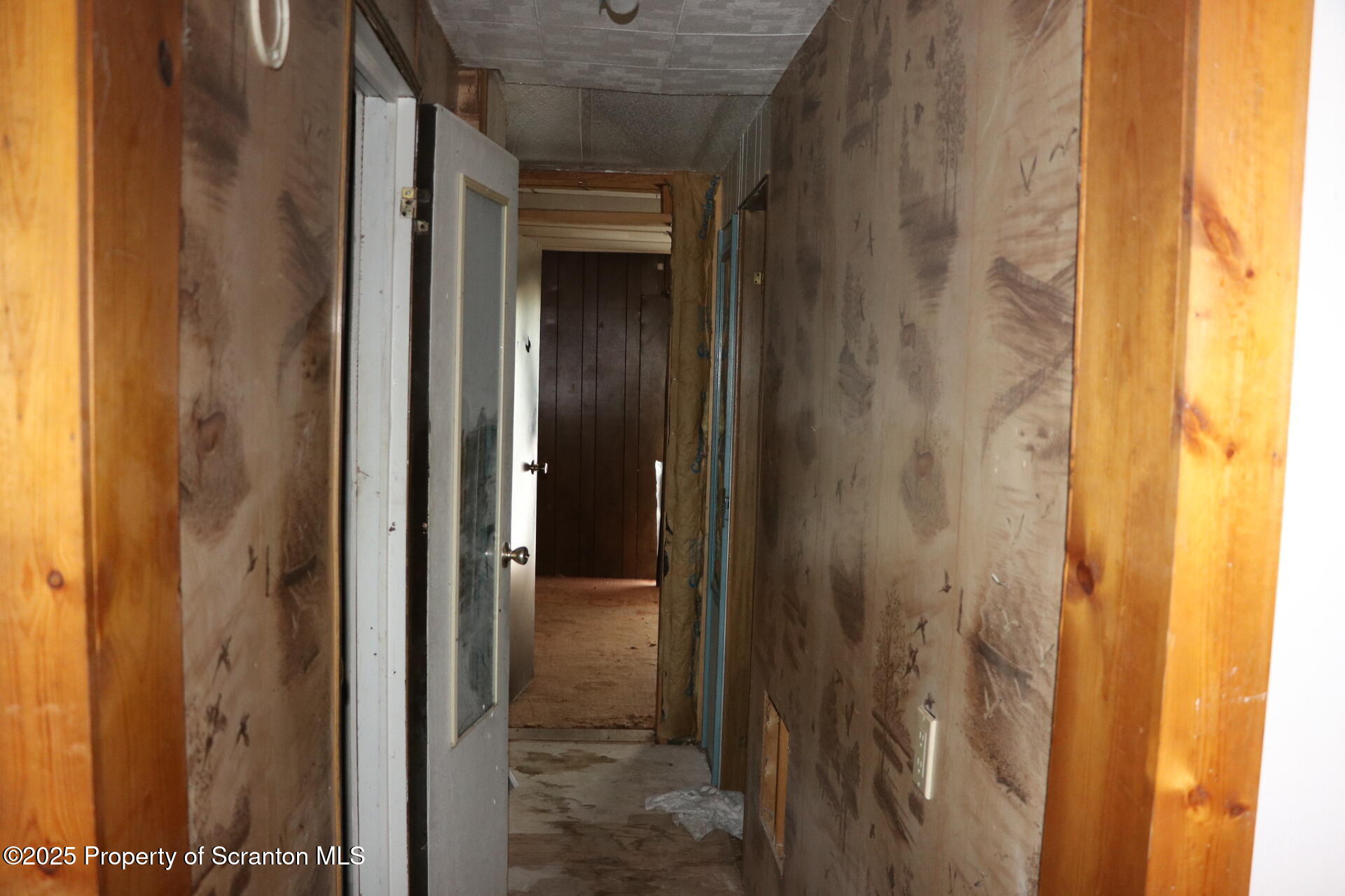 74 Matthews Road Moscow, PA 18444 - Photo 20 of 33 a view of a bathroom from a hallway