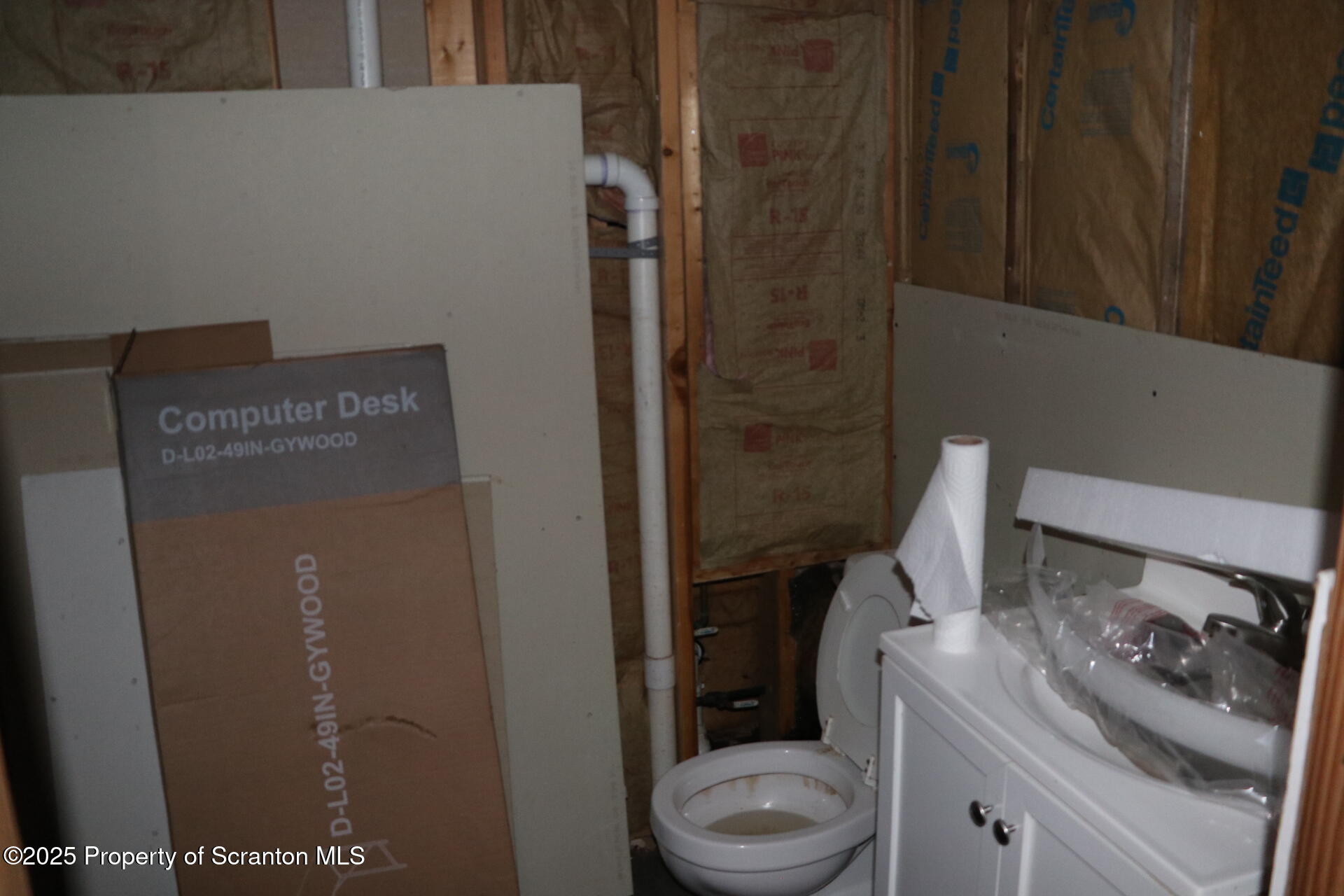 74 Matthews Road Moscow, PA 18444 - Photo 26 of 33 a white toilet sitting next to a bathroom sink
