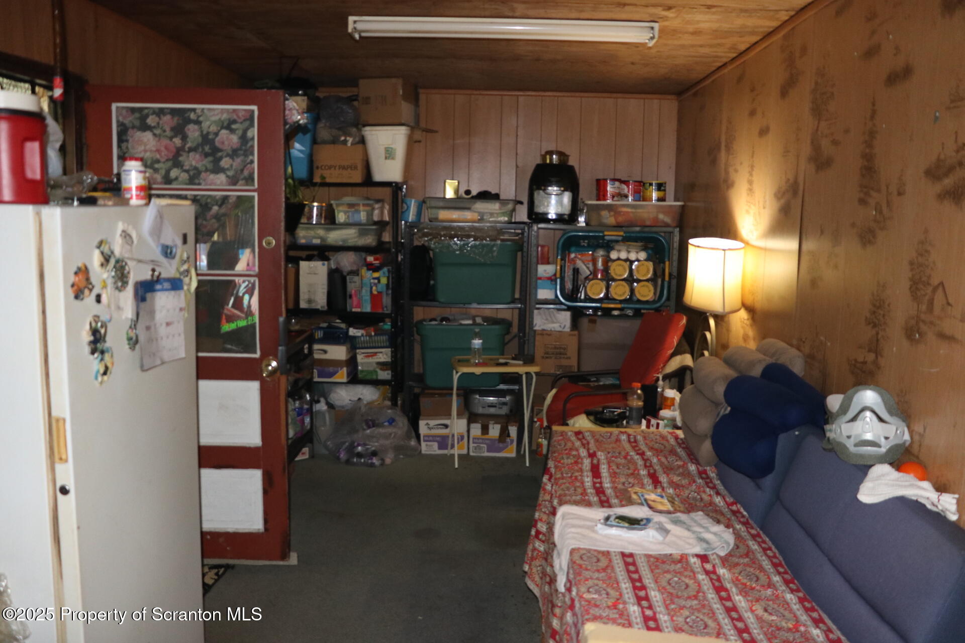 74 Matthews Road Moscow, PA 18444 - Photo 28 of 33 a room with lots of books and chairs