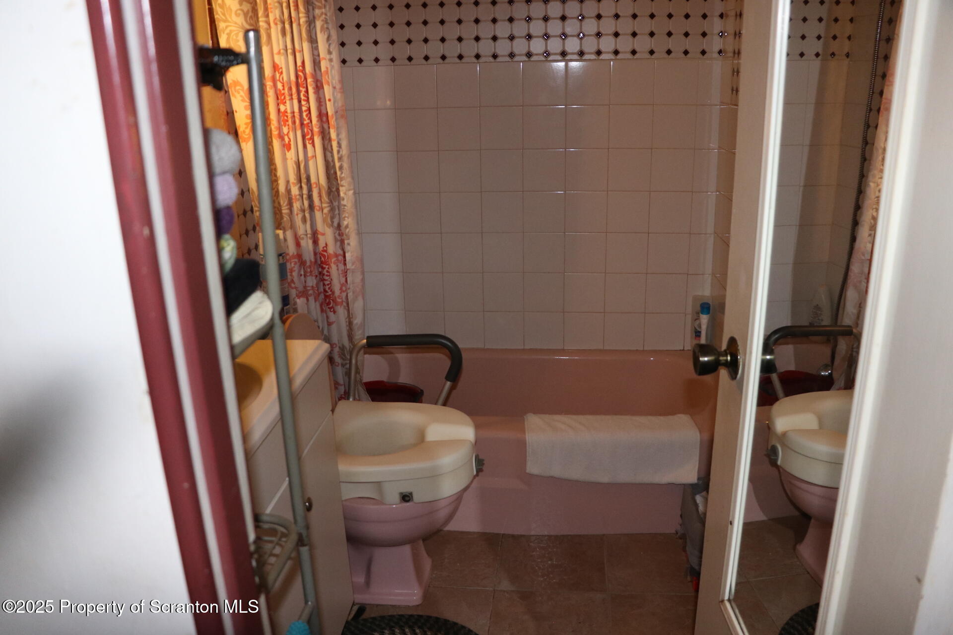 74 Matthews Road Moscow, PA 18444 - Photo 33 of 33 a bathroom with a sink and mirror