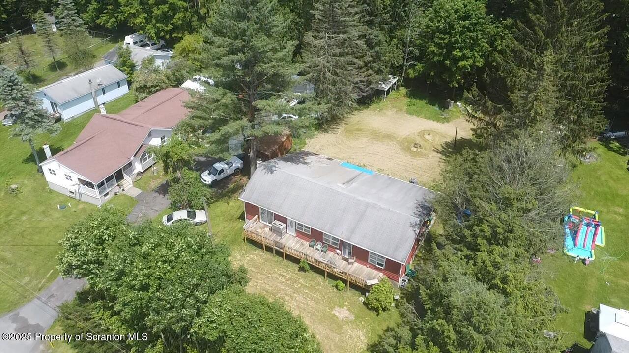 74 Matthews Road Moscow, PA 18444 - Photo 4 of 33 an aerial view of a house with a yard
