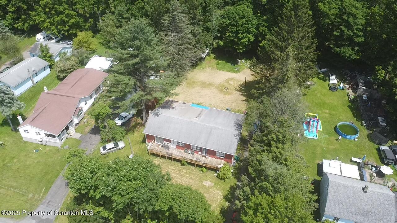 74 Matthews Road Moscow, PA 18444 - Photo 8 of 33 an aerial view of a house with a yard