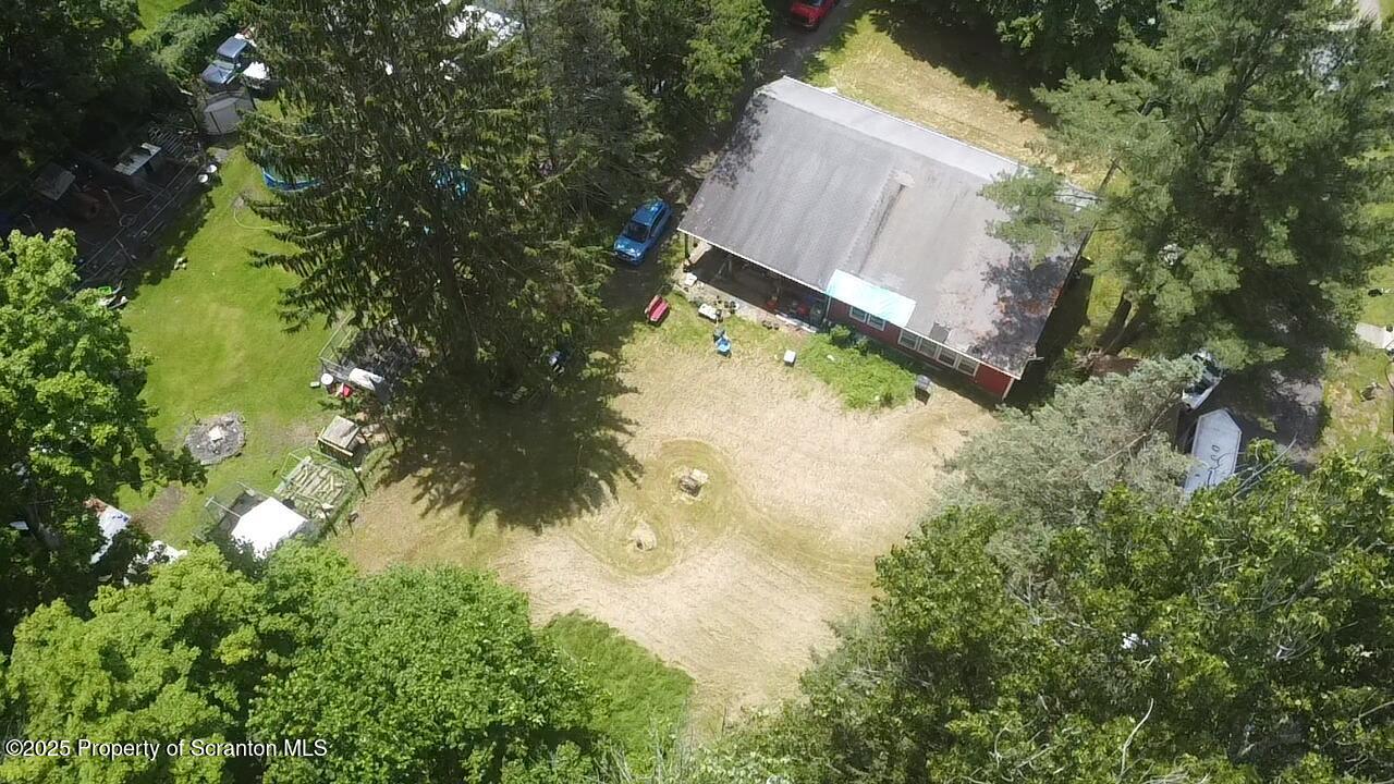 74 Matthews Road Moscow, PA 18444 - Photo 9 of 33 an aerial view of a house with yard swimming pool and outdoor seating