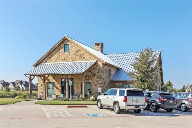 a car parked in front of a house