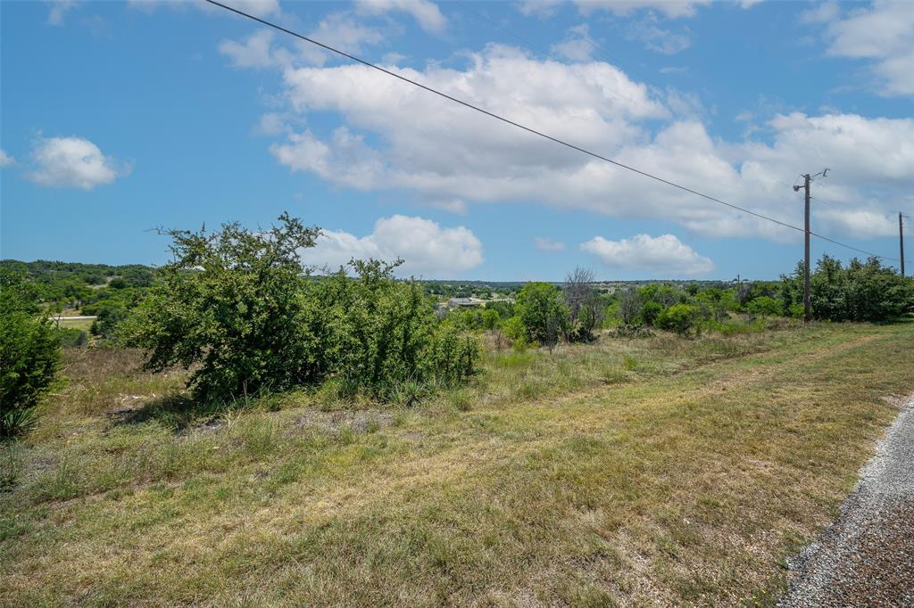 8021 Hells Gate Loop Strawn, TX 76475 - Photo 9 of 39 View of local wilderness with a rural view