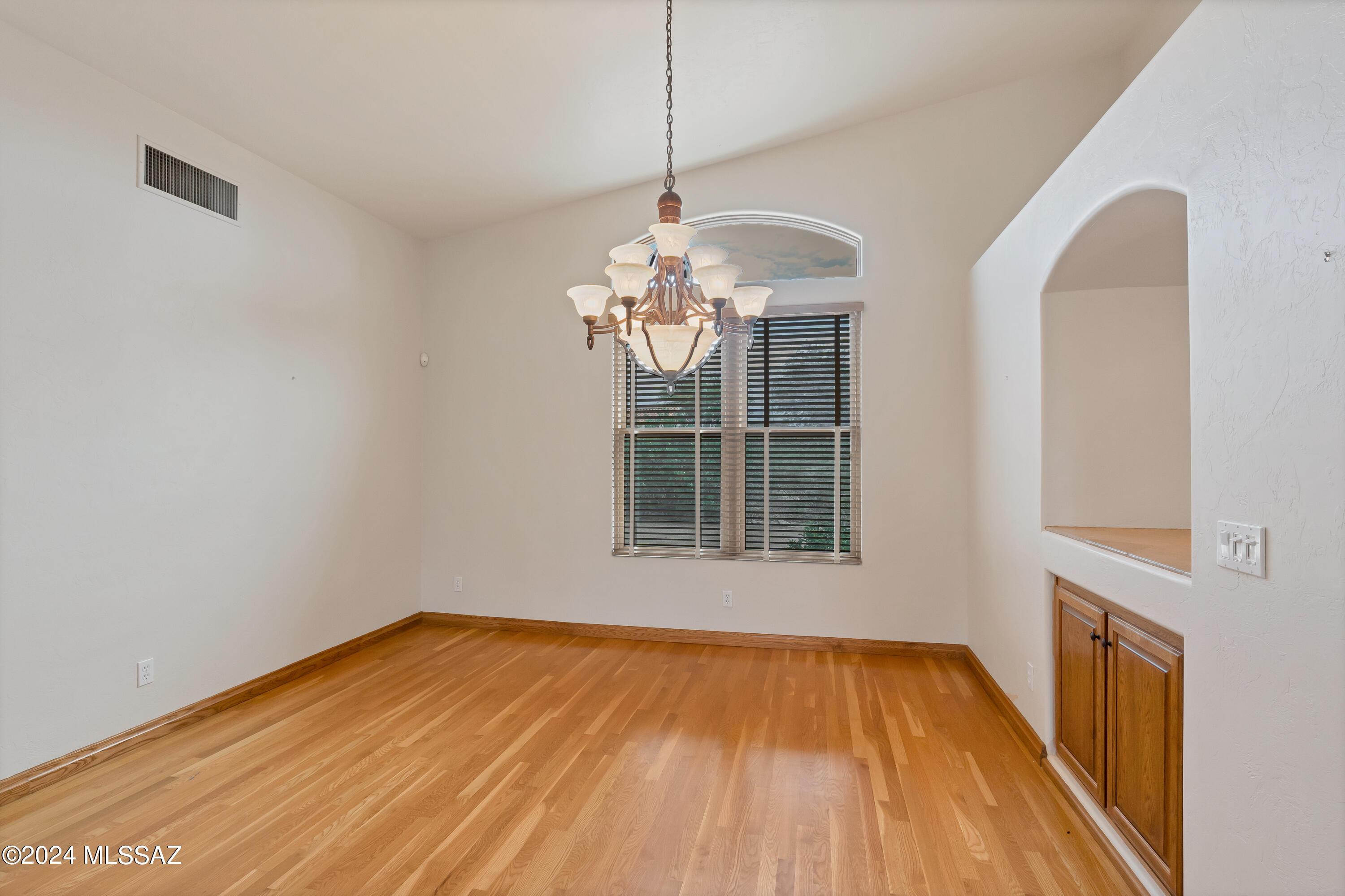 4001 North Harrison Road Tucson, AZ 85749 - Photo 23 of 50 a view of empty room with wooden floor
