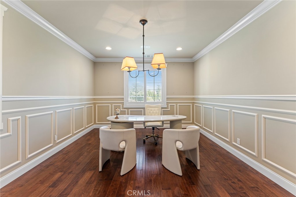 5836 Buckthorn Avenue Rancho Cucamonga, CA 91737 - Photo 12 of 63 a view of a dining room with furniture window and wooden floor