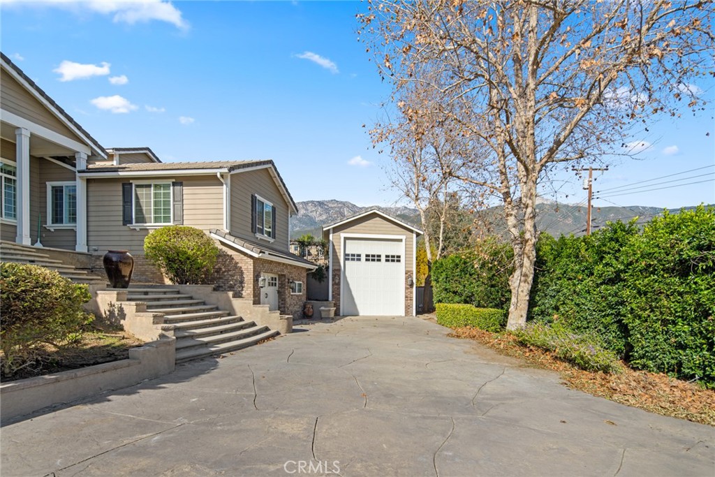 5836 Buckthorn Avenue Rancho Cucamonga, CA 91737 - Photo 19 of 63 a front view of a house with a yard