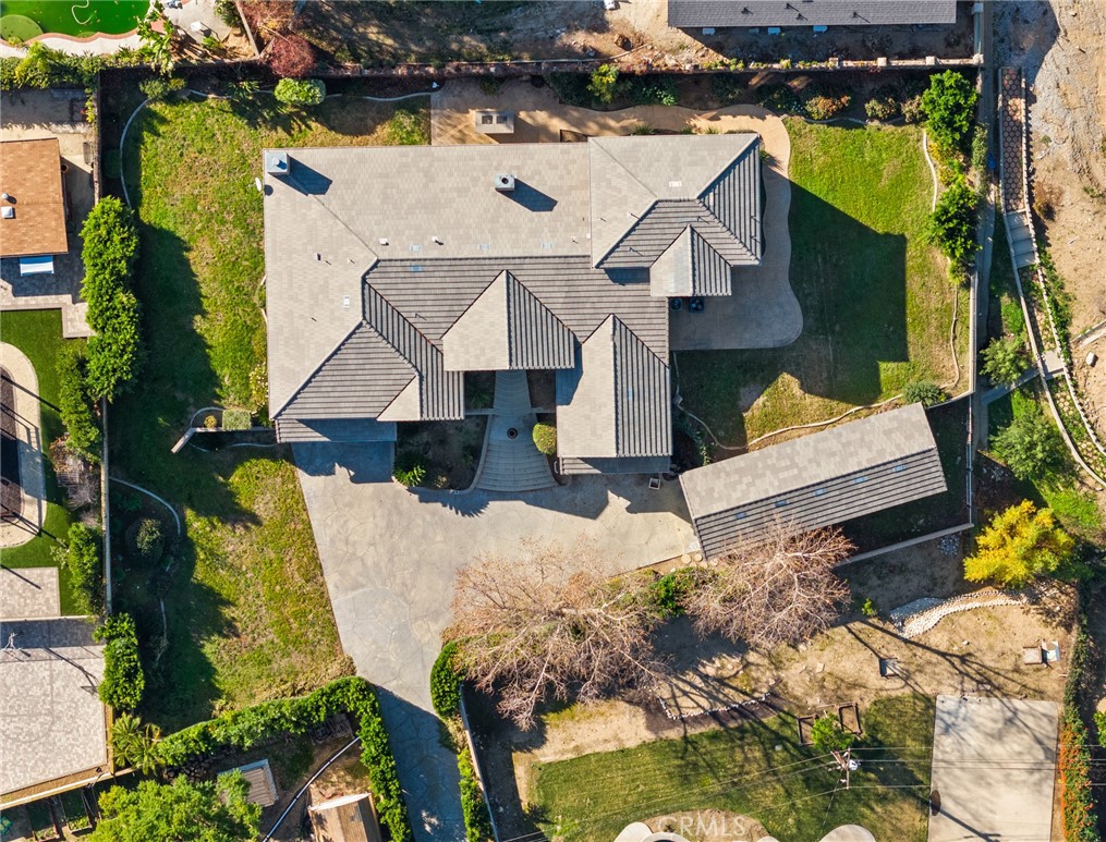 5836 Buckthorn Avenue Rancho Cucamonga, CA 91737 - Photo 27 of 63 an aerial view of residential houses with outdoor space
