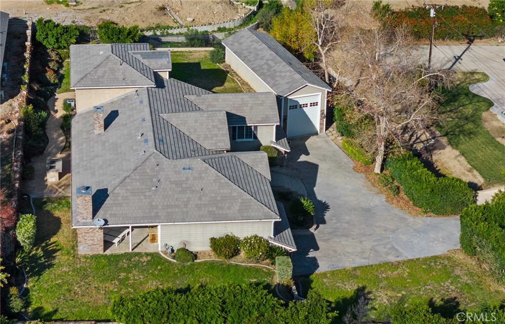 5836 Buckthorn Avenue Rancho Cucamonga, CA 91737 - Photo 36 of 63 an aerial view of a house with a yard