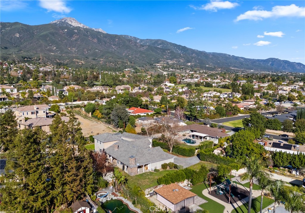 5836 Buckthorn Avenue Rancho Cucamonga, CA 91737 - Photo 4 of 63 an aerial view of residential houses with outdoor space