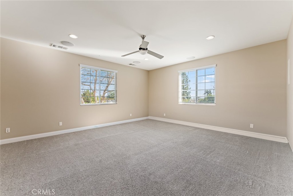 5836 Buckthorn Avenue Rancho Cucamonga, CA 91737 - Photo 43 of 63 a view of an empty room with a window