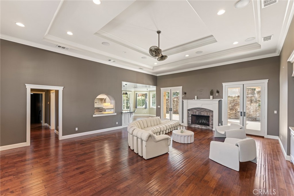 5836 Buckthorn Avenue Rancho Cucamonga, CA 91737 - Photo 7 of 63 a living room with furniture fireplace and flat screen tv