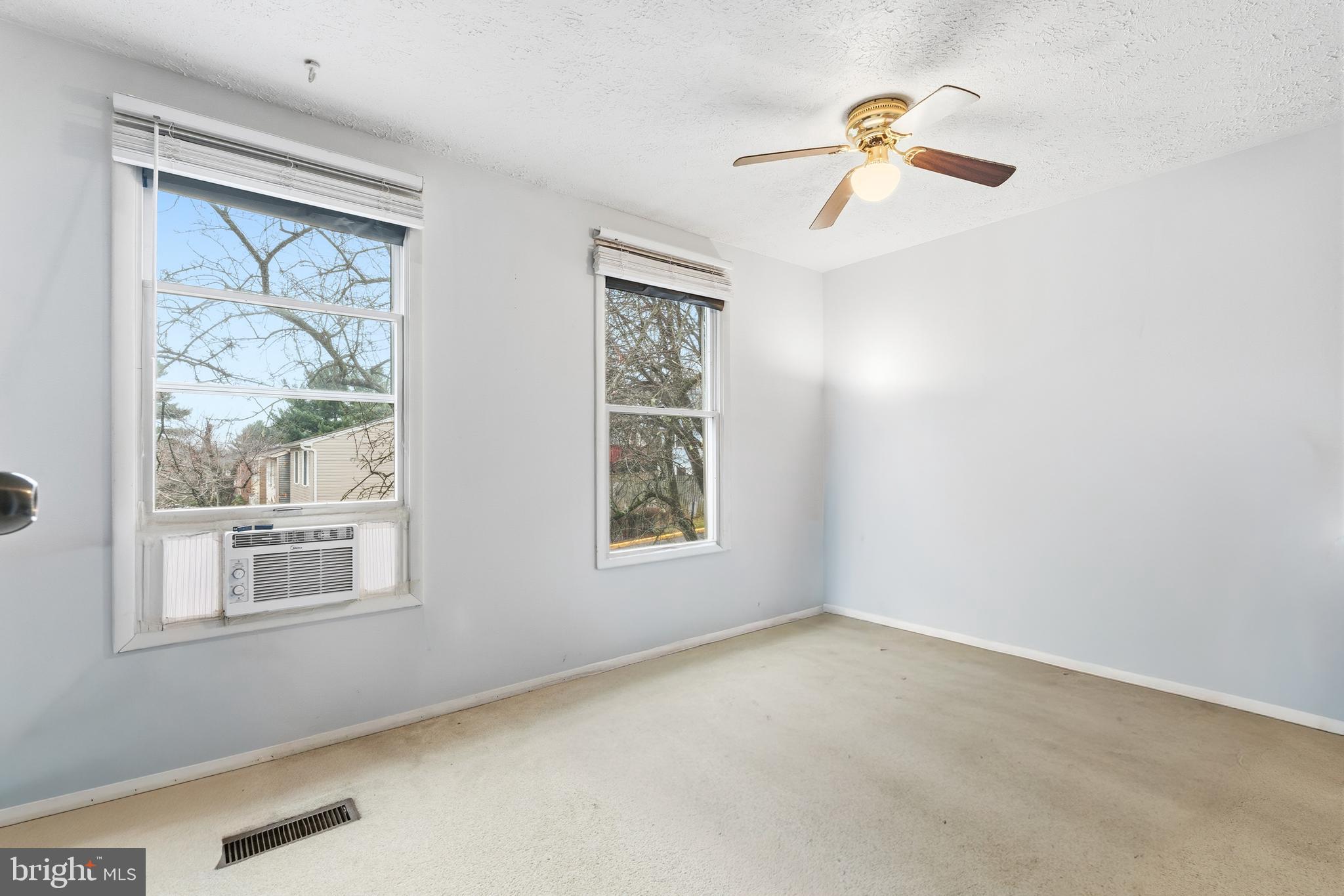 19218 Misty Meadow Terrace Germantown, MD 20874 - Photo 13 of 17 a view of an empty room with a window