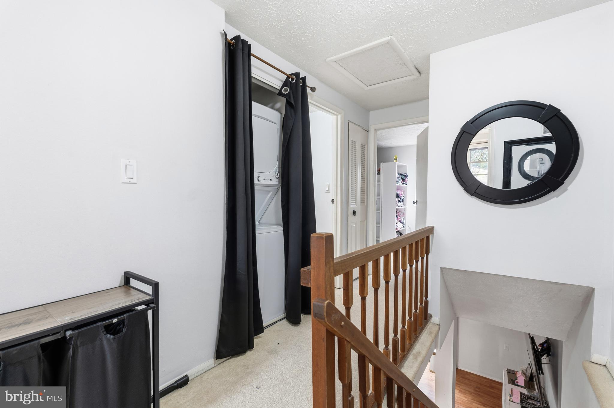 19218 Misty Meadow Terrace Germantown, MD 20874 - Photo 10 of 17 a view of a hallway with wooden floor