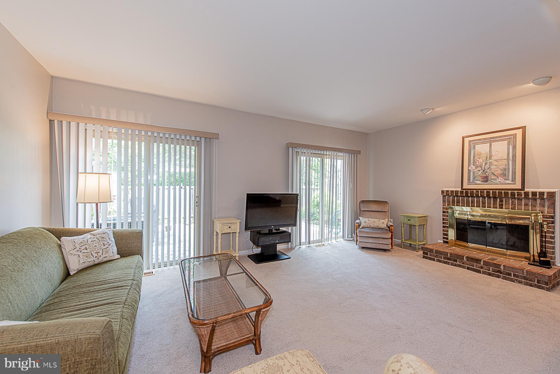 5388 Eliots Oak Road Columbia, MD 21044 - Photo 13 of 24 Expansive Family Room with Wood-burning Fireplace