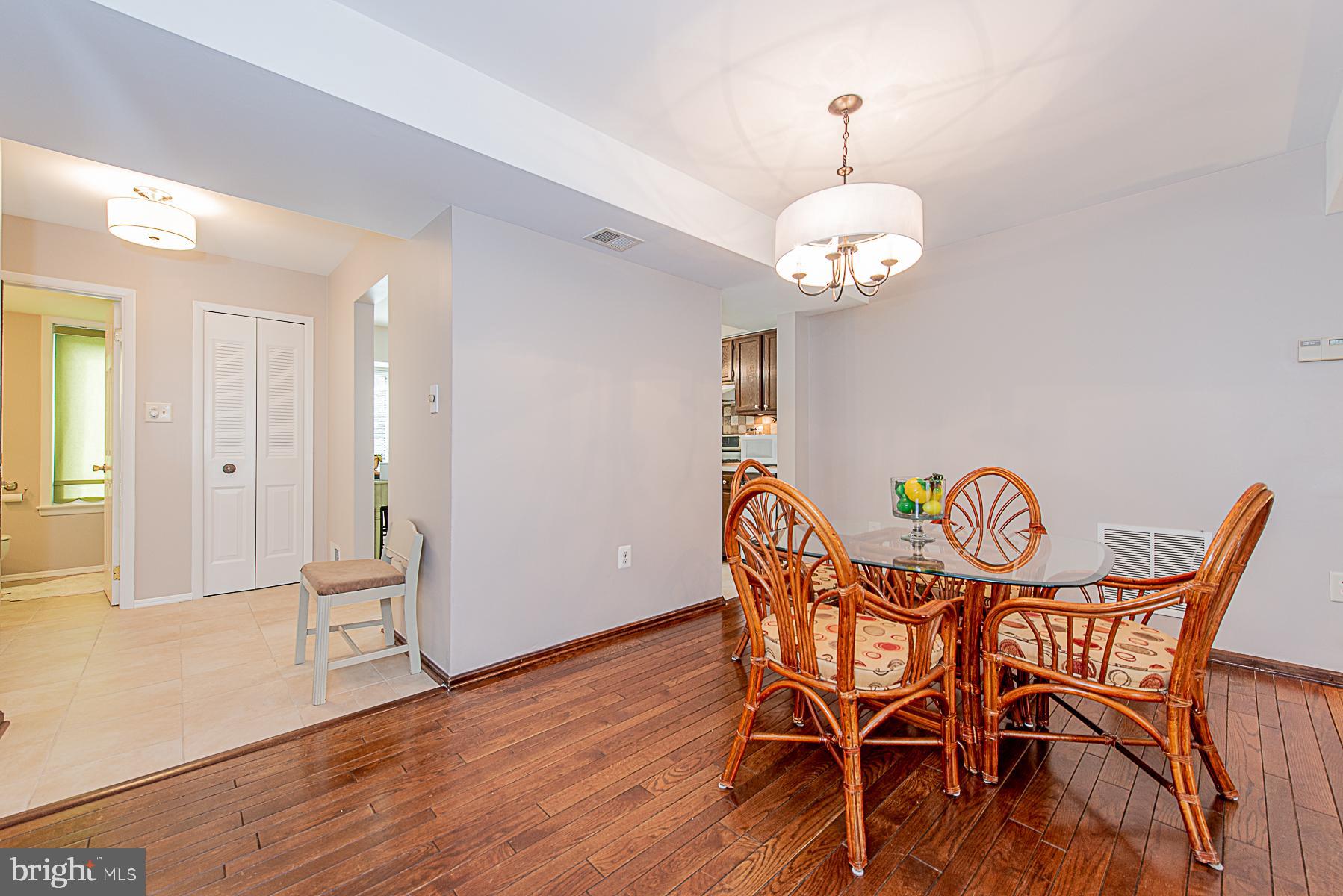 5388 Eliots Oak Road Columbia, MD 21044 - Photo 10 of 24 Large Dining Room with Gleaming Hardwoods
