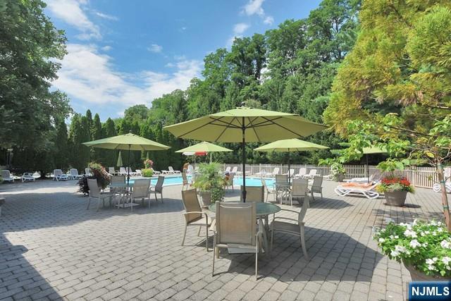 201 Beech Court Norwood, NJ 07648 - Photo 11 of 12 a view of a backyard with a patio and garden