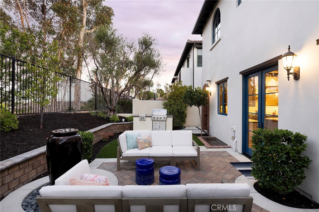 35209 Del Rey Dana Point, CA 92624 - Photo 15 of 44 a view of a patio with couches table and chairs and potted plants