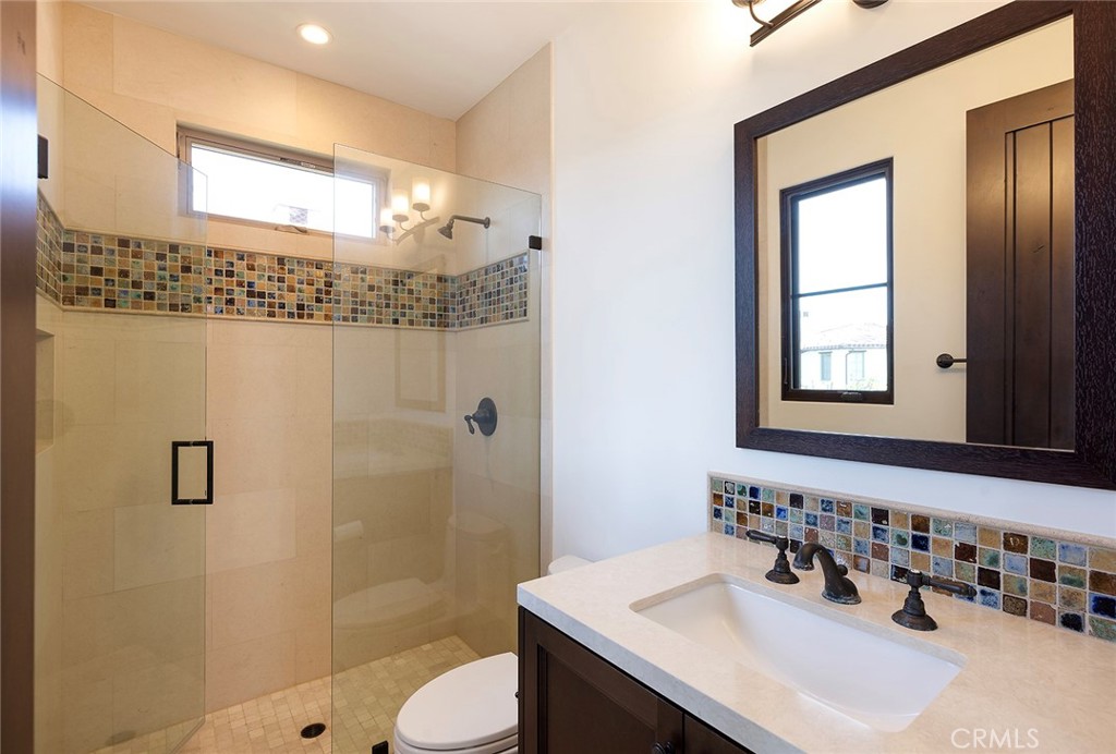 35209 Del Rey Dana Point, CA 92624 - Photo 27 of 44 a bathroom with a sink and a mirror