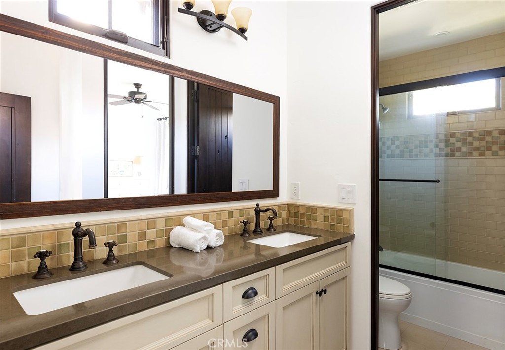 35209 Del Rey Dana Point, CA 92624 - Photo 29 of 44 a bathroom with a sink and a mirror