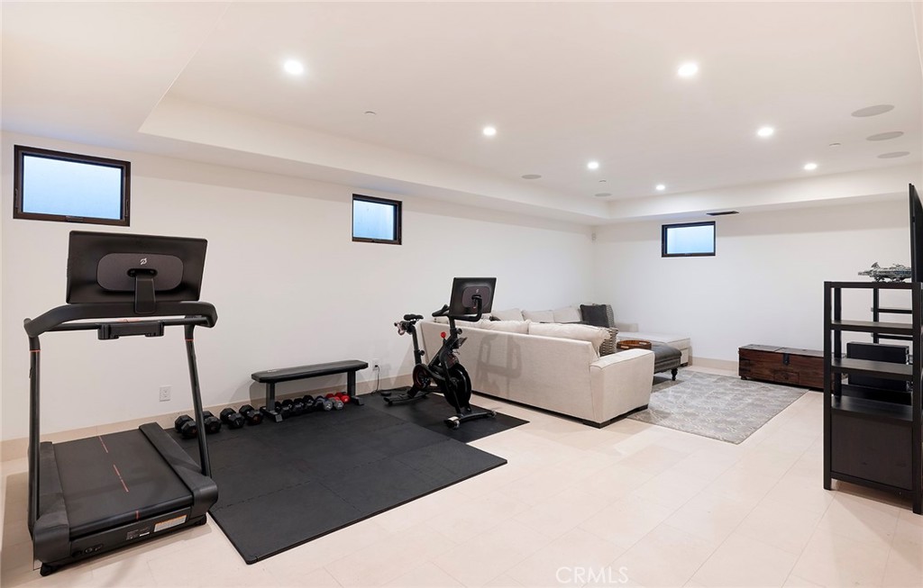 35209 Del Rey Dana Point, CA 92624 - Photo 33 of 44 a living room with furniture and a flat screen tv