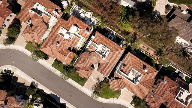 an aerial view of residential house with outdoor space