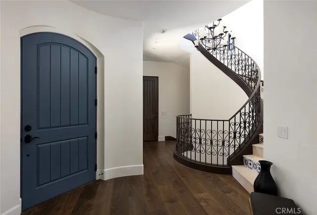 a view of entryway with wooden floor
