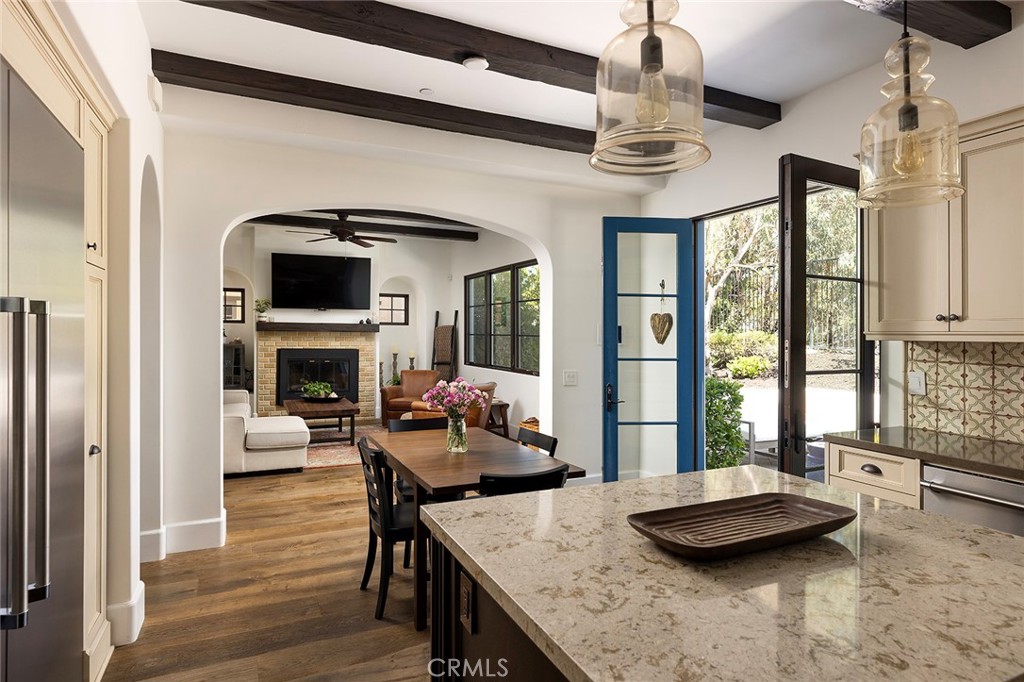 35209 Del Rey Dana Point, CA 92624 - Photo 10 of 44 a living room with furniture fireplace and flat screen tv