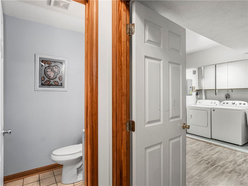 317 Brohios Drive Monaca, PA 15061 - Photo 21 of 27 a bathroom with a sink a toilet and shower