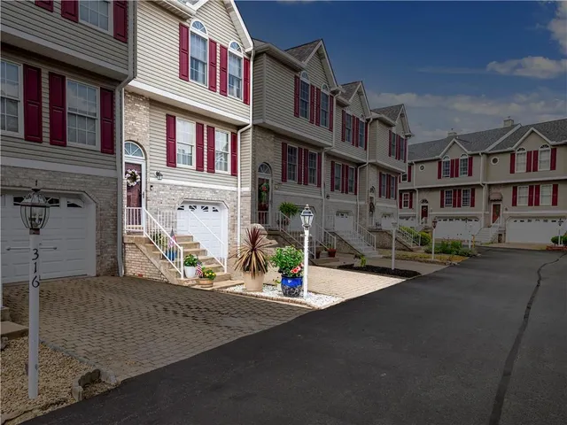 front view of a building with a street