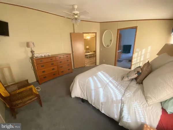 a spacious bathroom with a bathtub and a sink