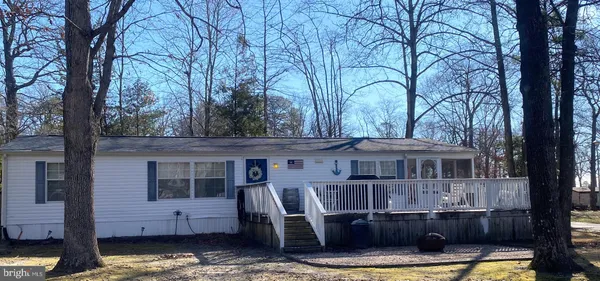 a front view of a house with swimming pool