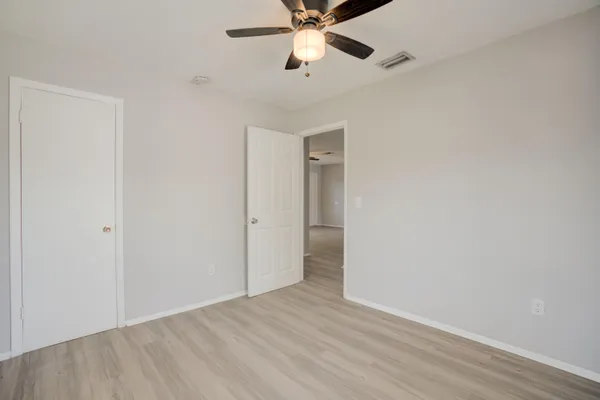 a view of an empty room and window