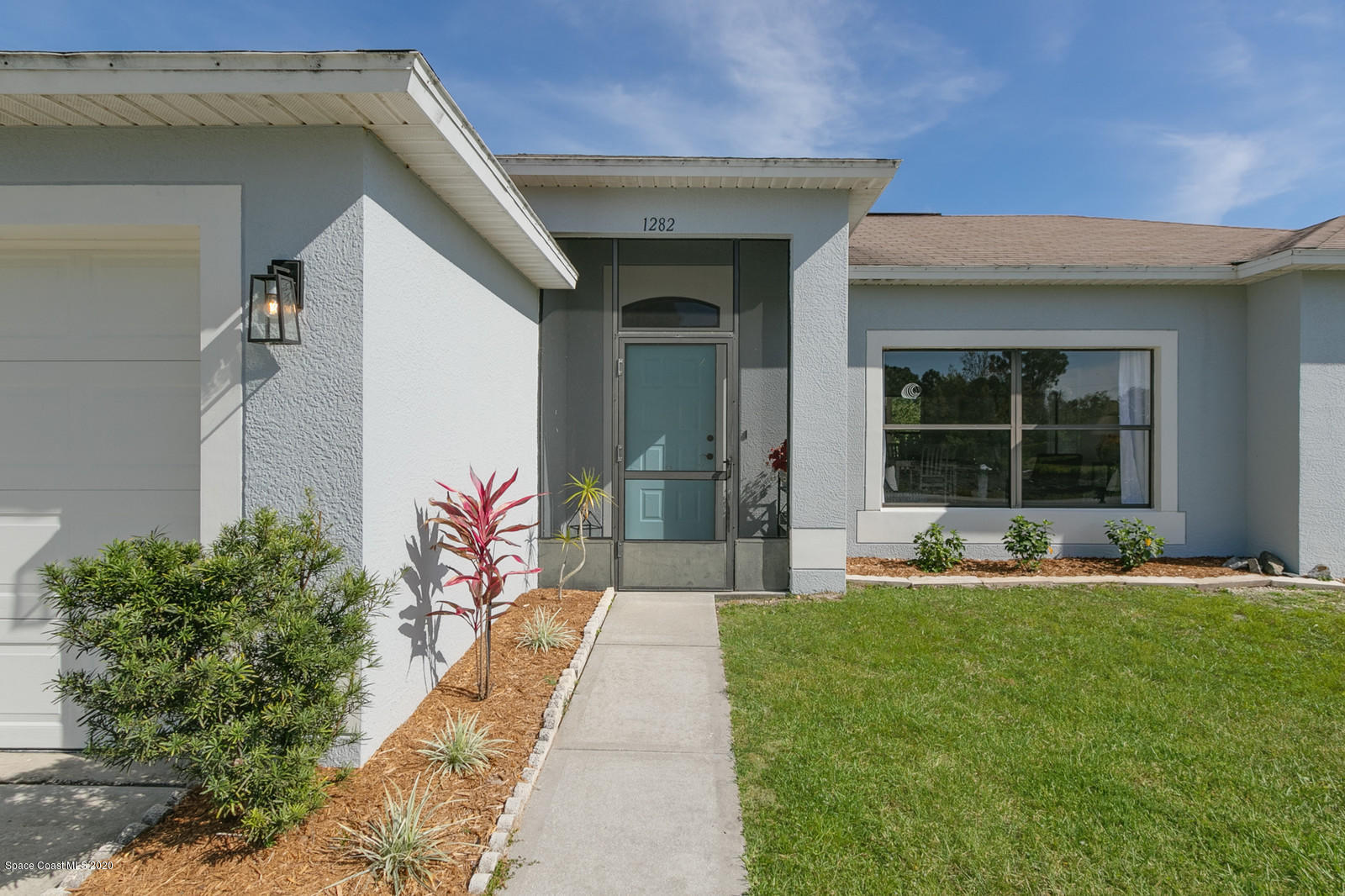 1282 Ragen Road Southeast Palm Bay, FL 32909 - Photo 21 of 22 Front Door
