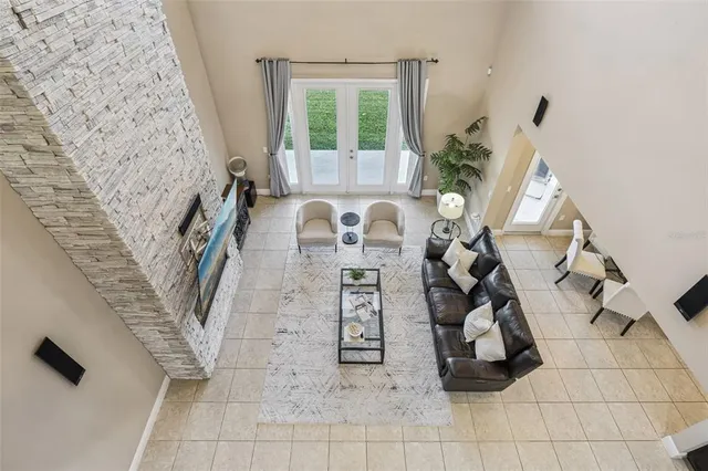 a bedroom with a bed window and dresser
