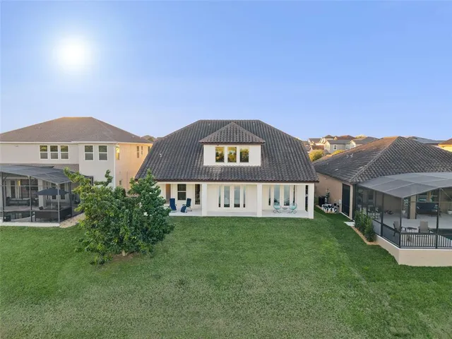 a view of a house with swimming pool