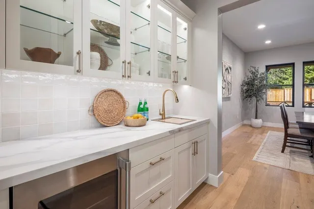 a bedroom with a large bed and a couch