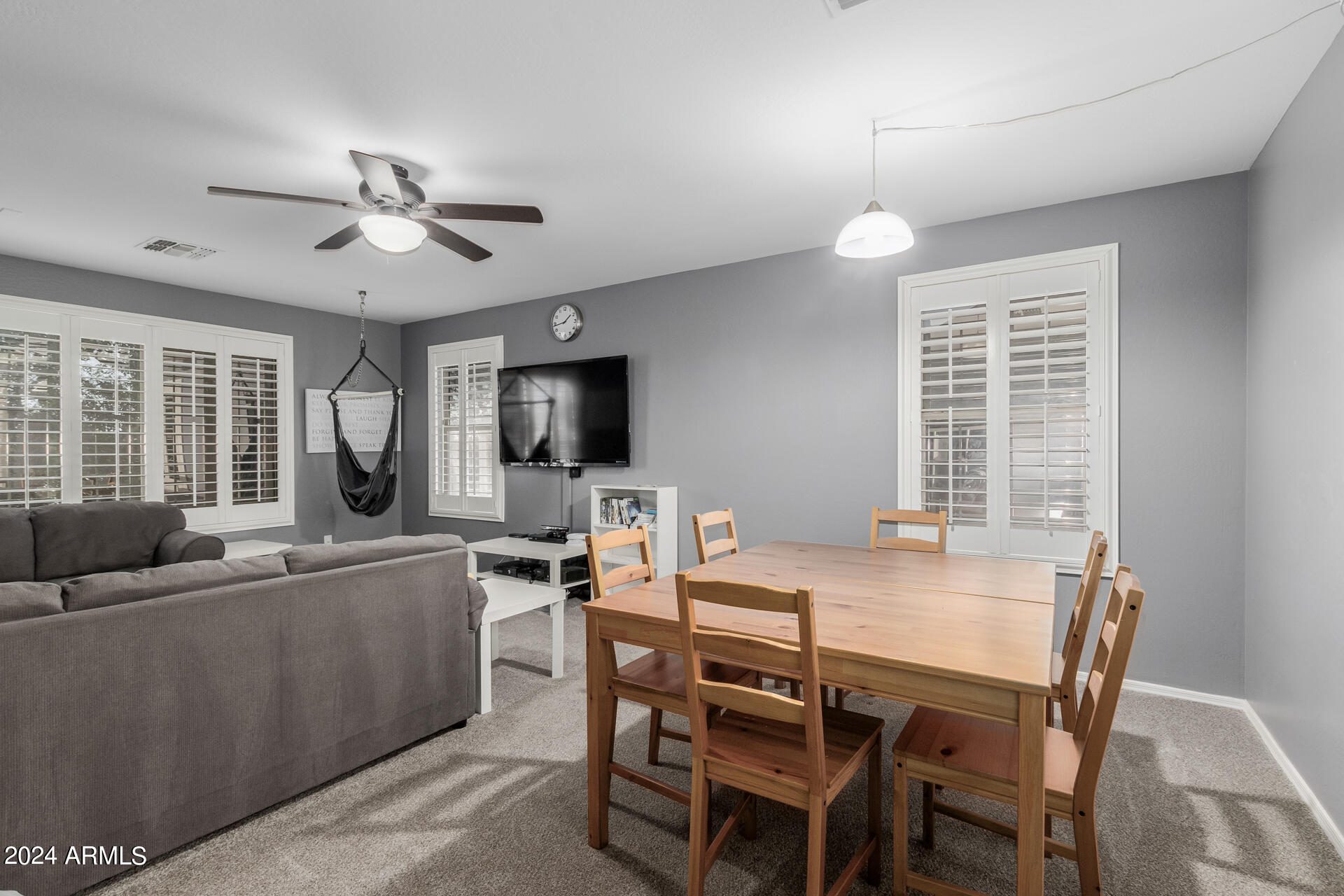 3353 East Blue Ridge Way Gilbert, AZ 85298 - Photo 27 of 50 a view of a dining room with furniture window and outside view