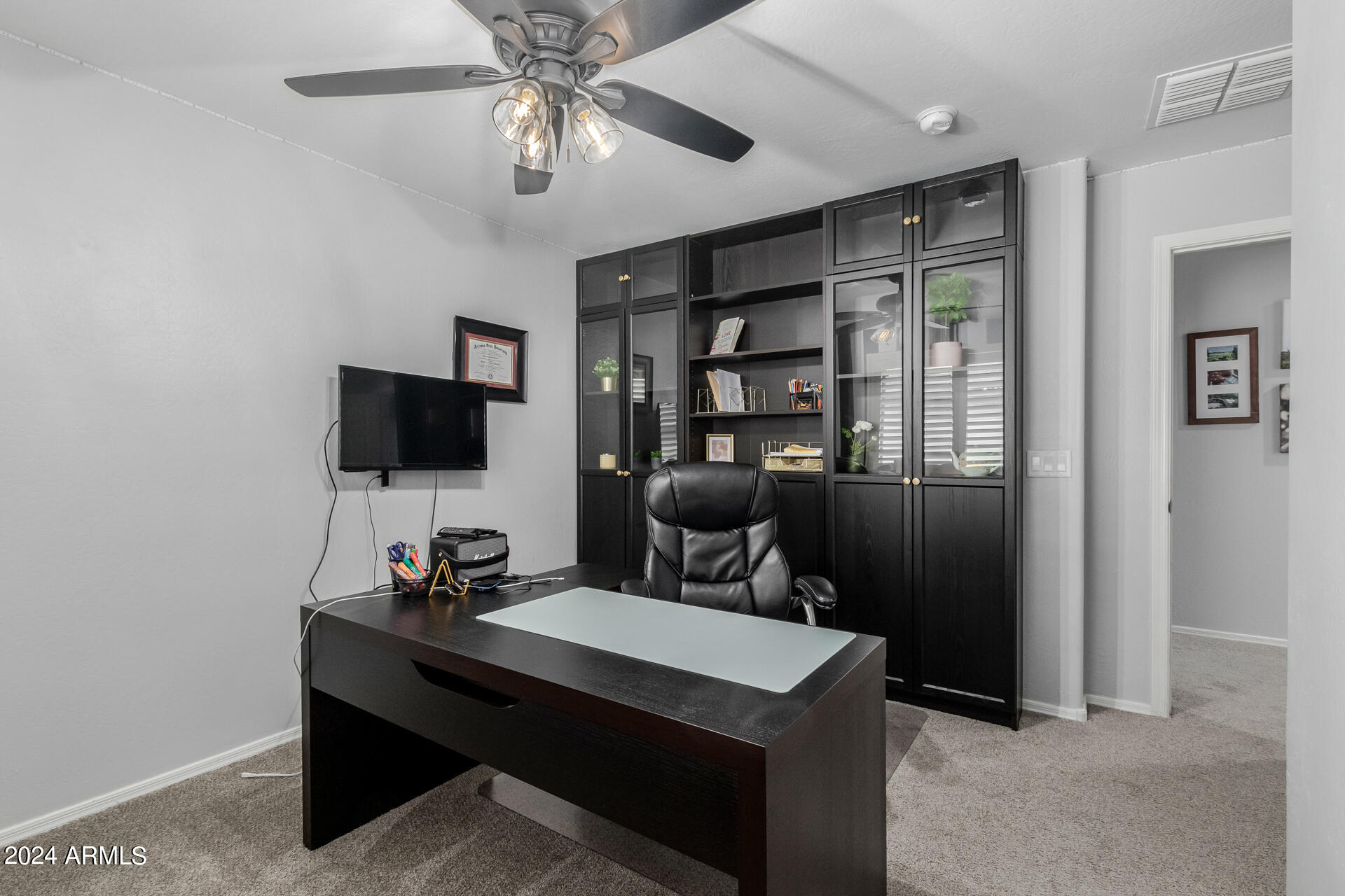 3353 East Blue Ridge Way Gilbert, AZ 85298 - Photo 32 of 50 a view of a workspace with furniture