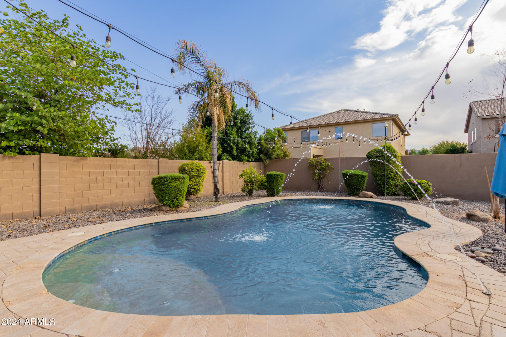 3353 East Blue Ridge Way Gilbert, AZ 85298 - Photo 34 of 50 an outdoor view with yard