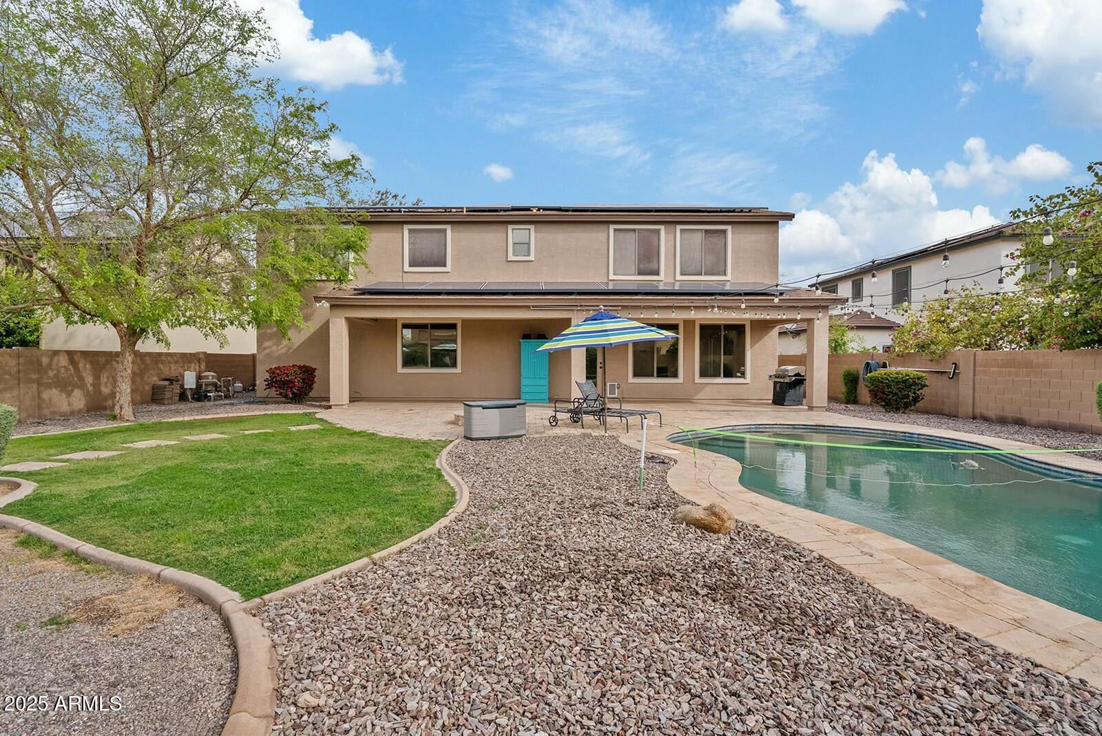 3353 East Blue Ridge Way Gilbert, AZ 85298 - Photo 49 of 50 front view of a house with a yard