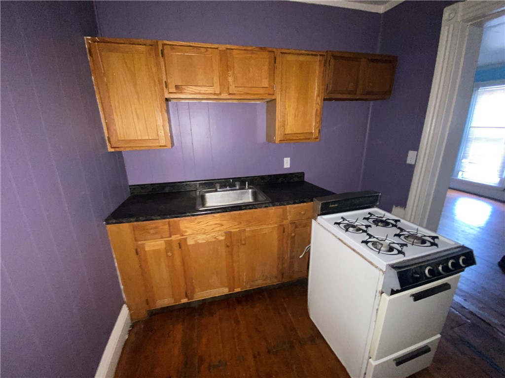 123 Griffith Street Rochester, NY 14607 - Photo 17 of 49 Unit just vacated- that's why stove was moved out-