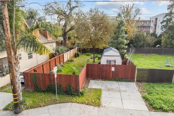 a house view with a garden space