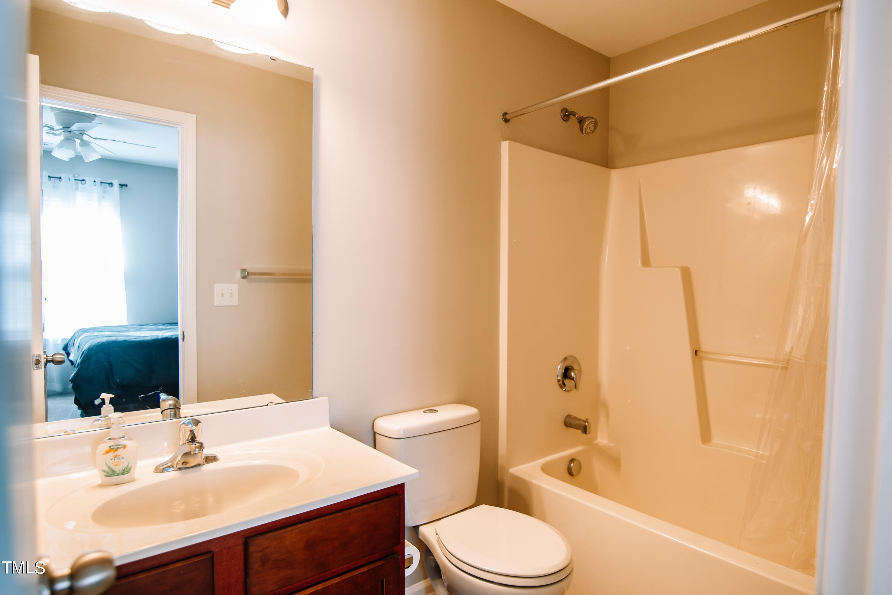 11206 Lofty Heights Place Raleigh, NC 27614 - Photo 11 of 19 Bathroom features vanity and tub/shower combo.