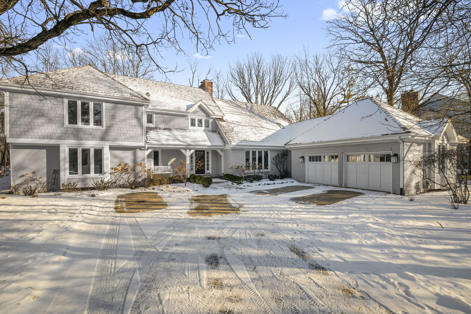 175 Margate Court Lake Bluff, IL 60044 - Photo 1 of 57 a view of a white house with a swimming pool and sitting area